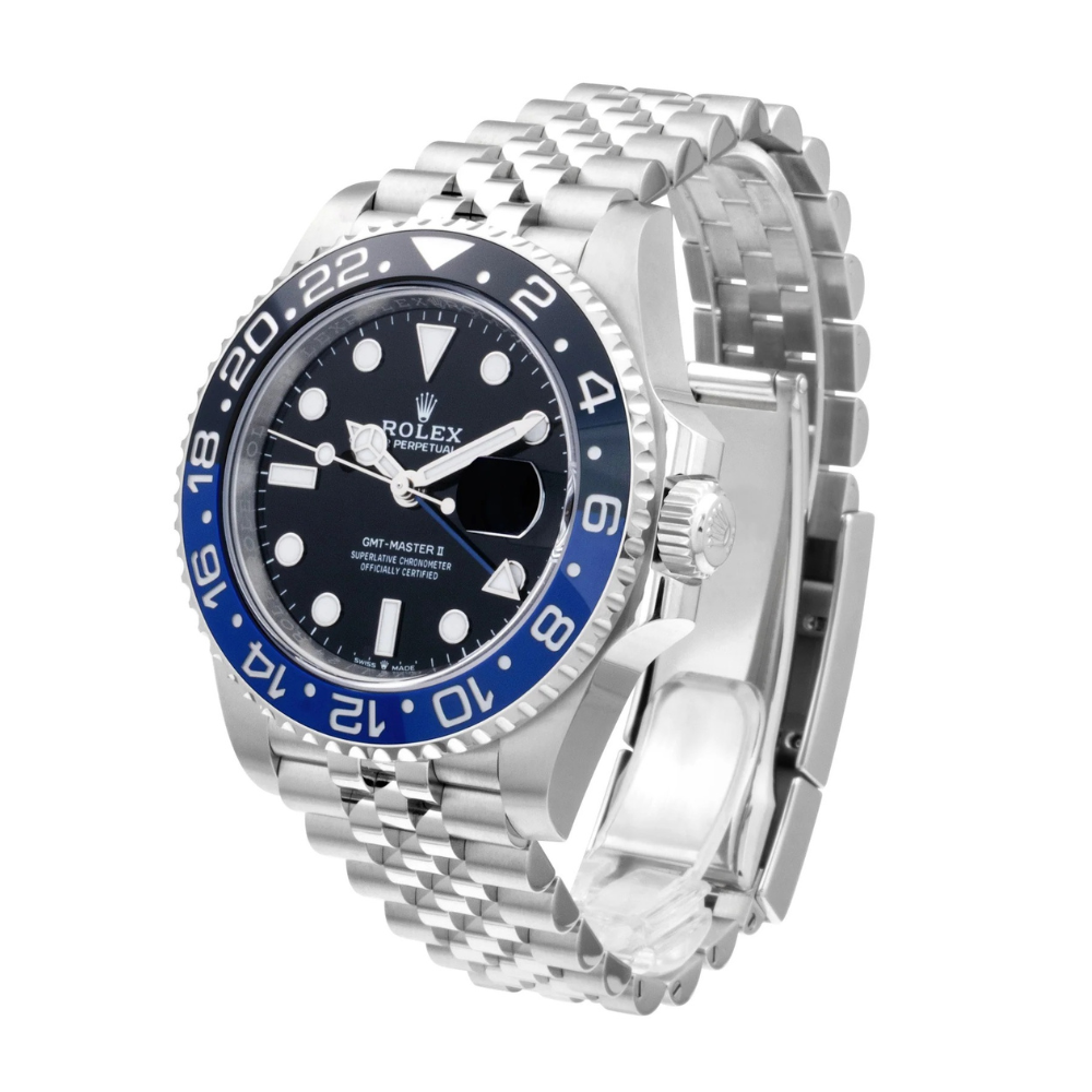 Steel GMT, two-tone black and blue 24-hour bezel, black dial with round markers, blue GMT hand, steel bracelet