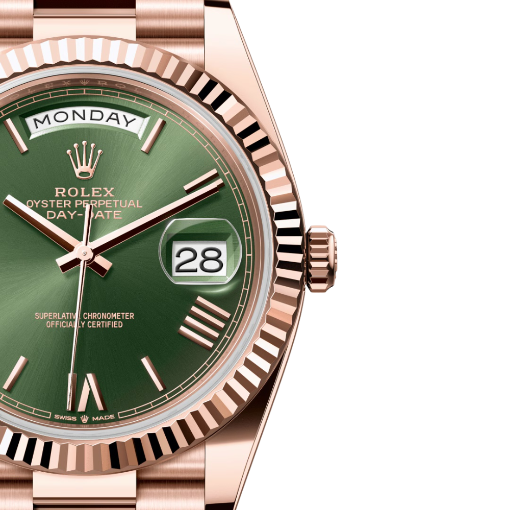 Full rose gold, wide polished bezel, green sunburst dial