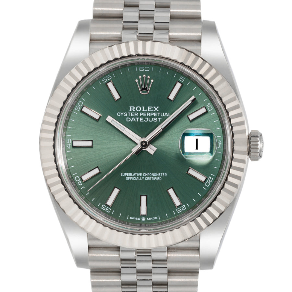 Classic three-hand, steel, green sunburst dial