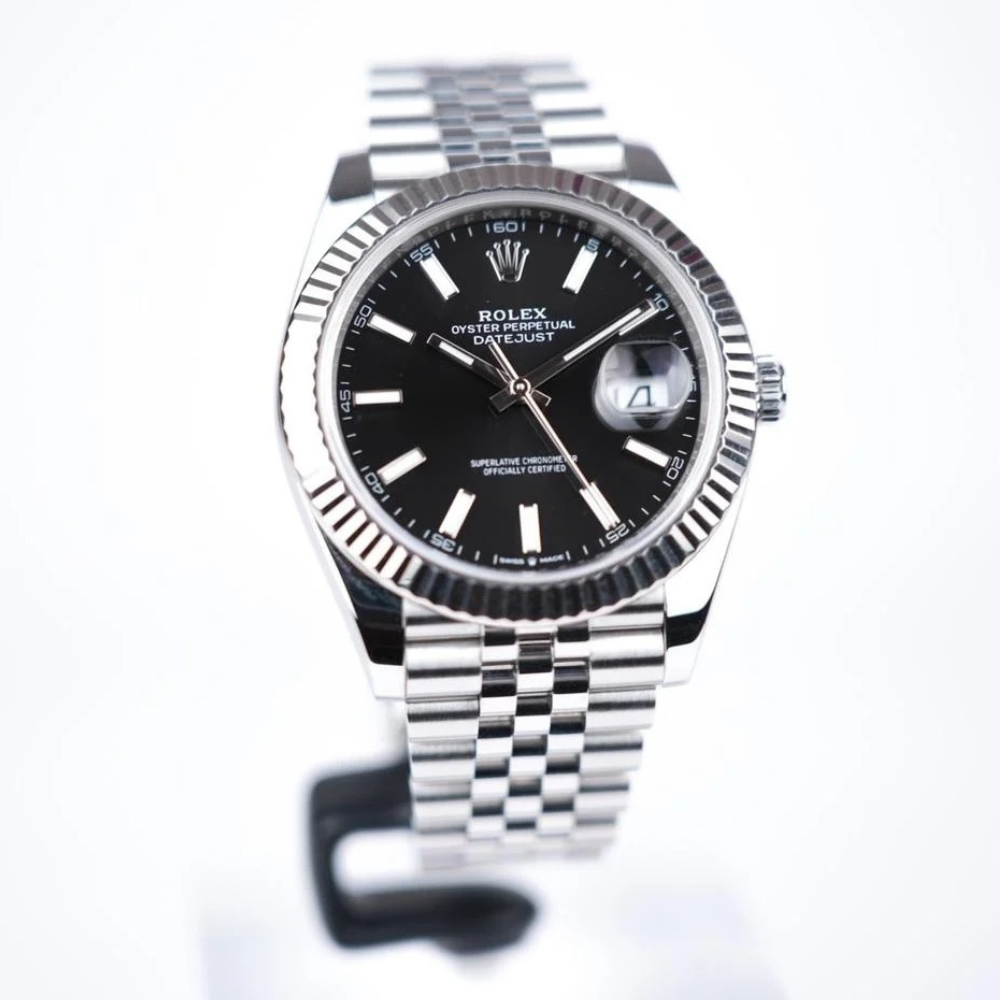 Classic three-hand, steel, plain black dial