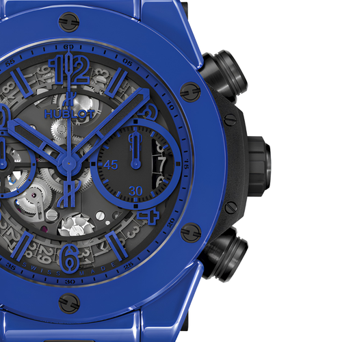 Angular blue and black sport case, skeleton dial with blue accents, blue rubber strap