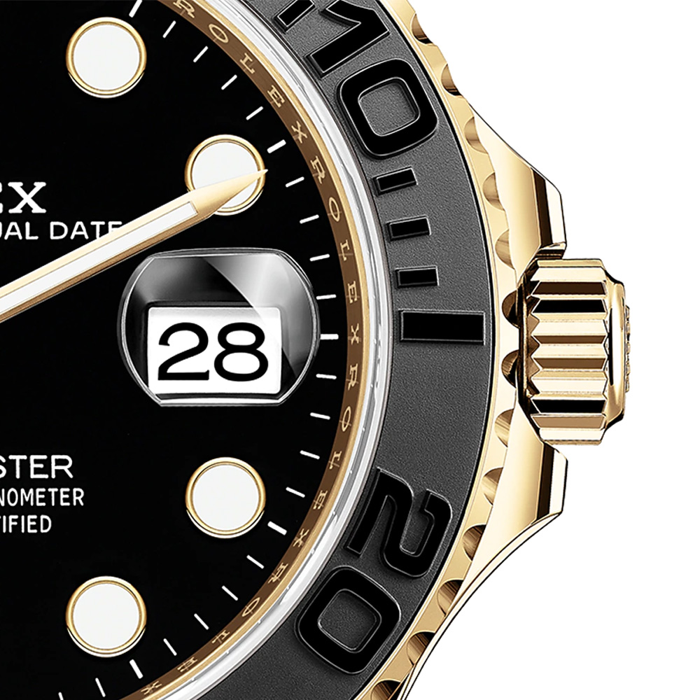 Gold case with black octagonal bezel, black dial, black rubber strap
