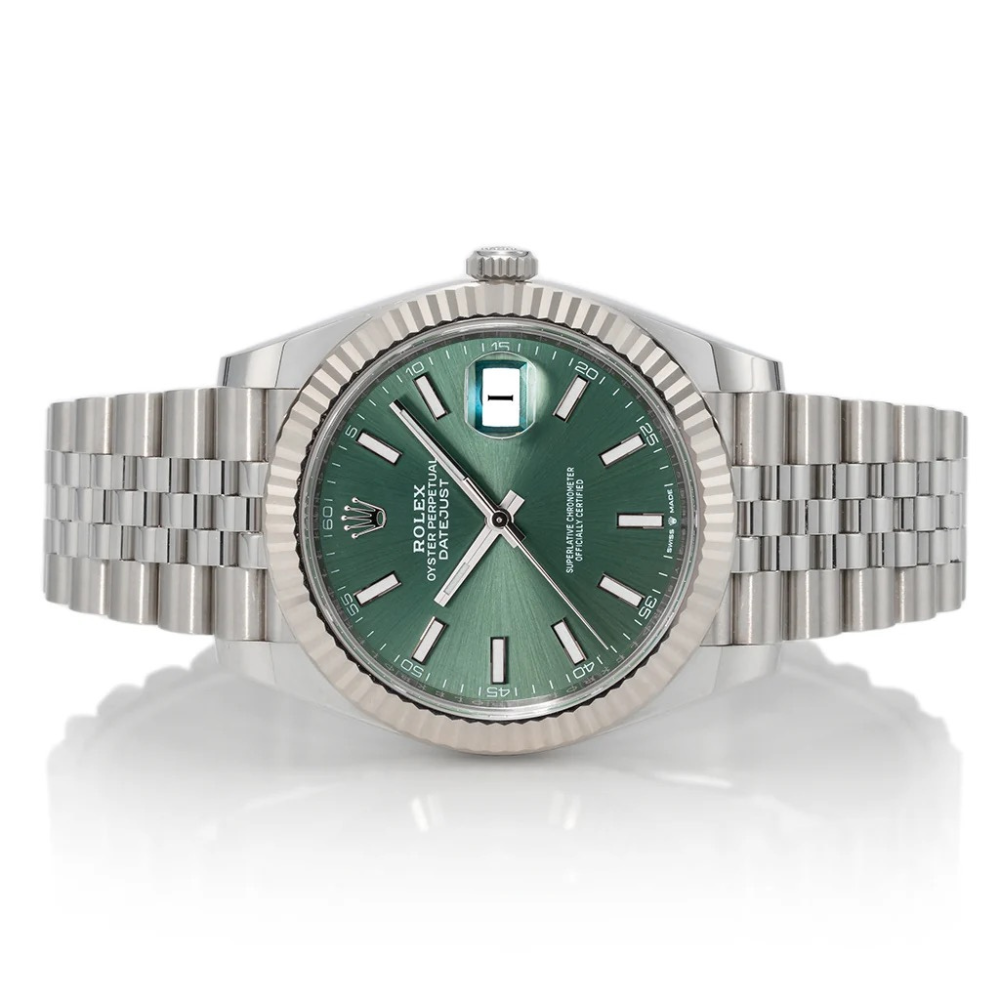 Classic three-hand, steel, green sunburst dial