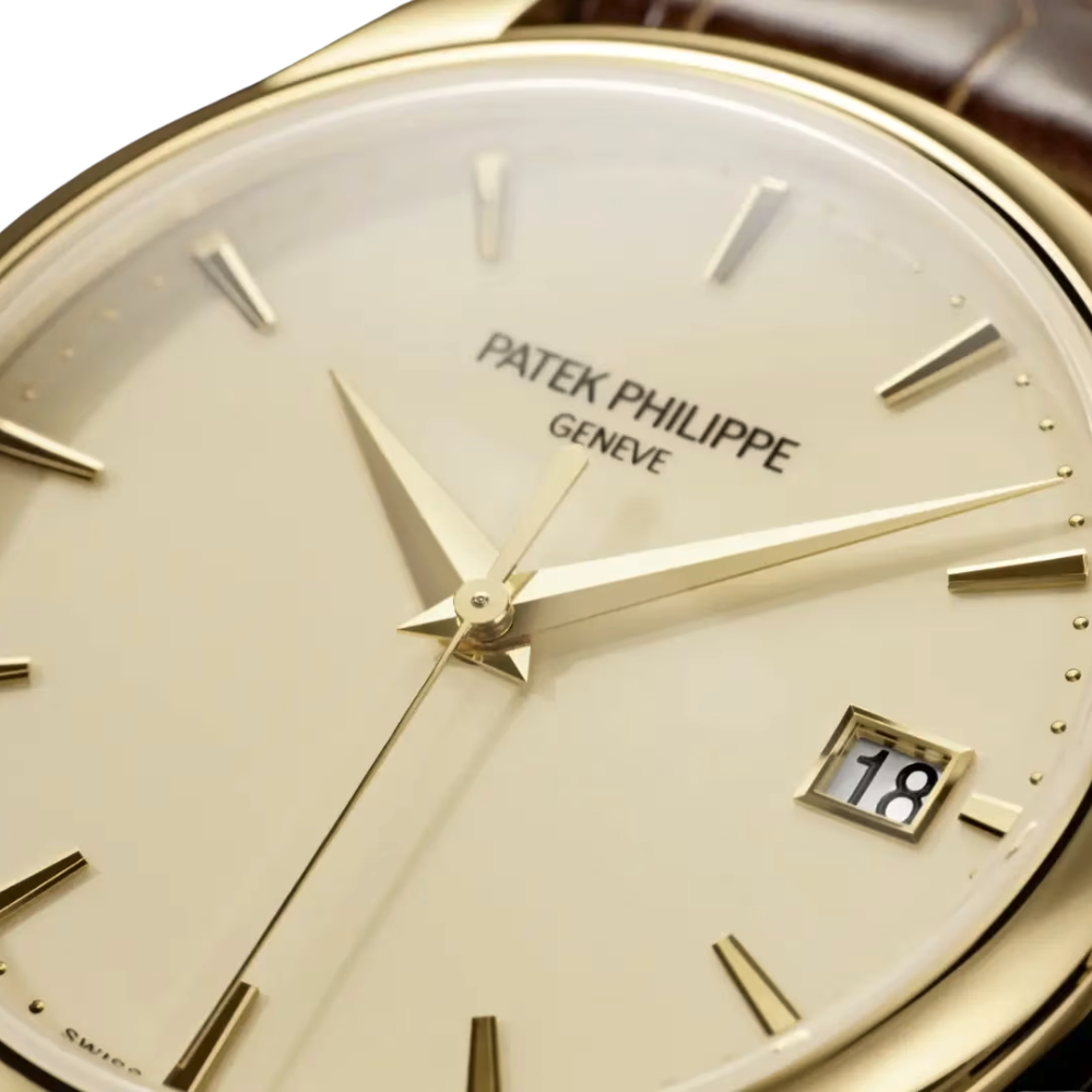 Rectangular gold case, cream champagne dial, croco-textured brown leather strap