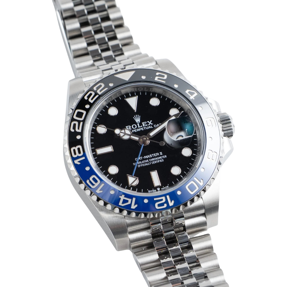 Steel GMT, two-tone black and blue 24-hour bezel, black dial with round markers, blue GMT hand, steel bracelet
