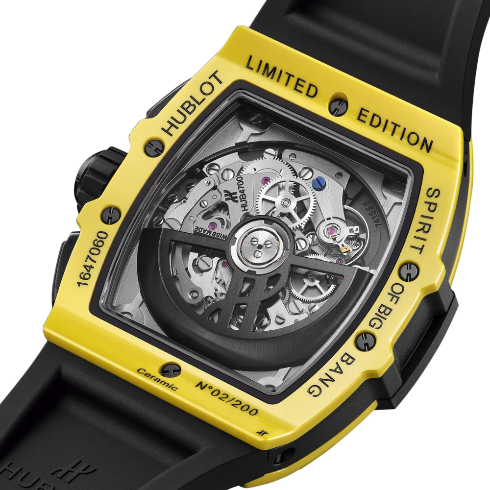 Sporty black and yellow tonneau, skeleton dial, yellow rubber strap