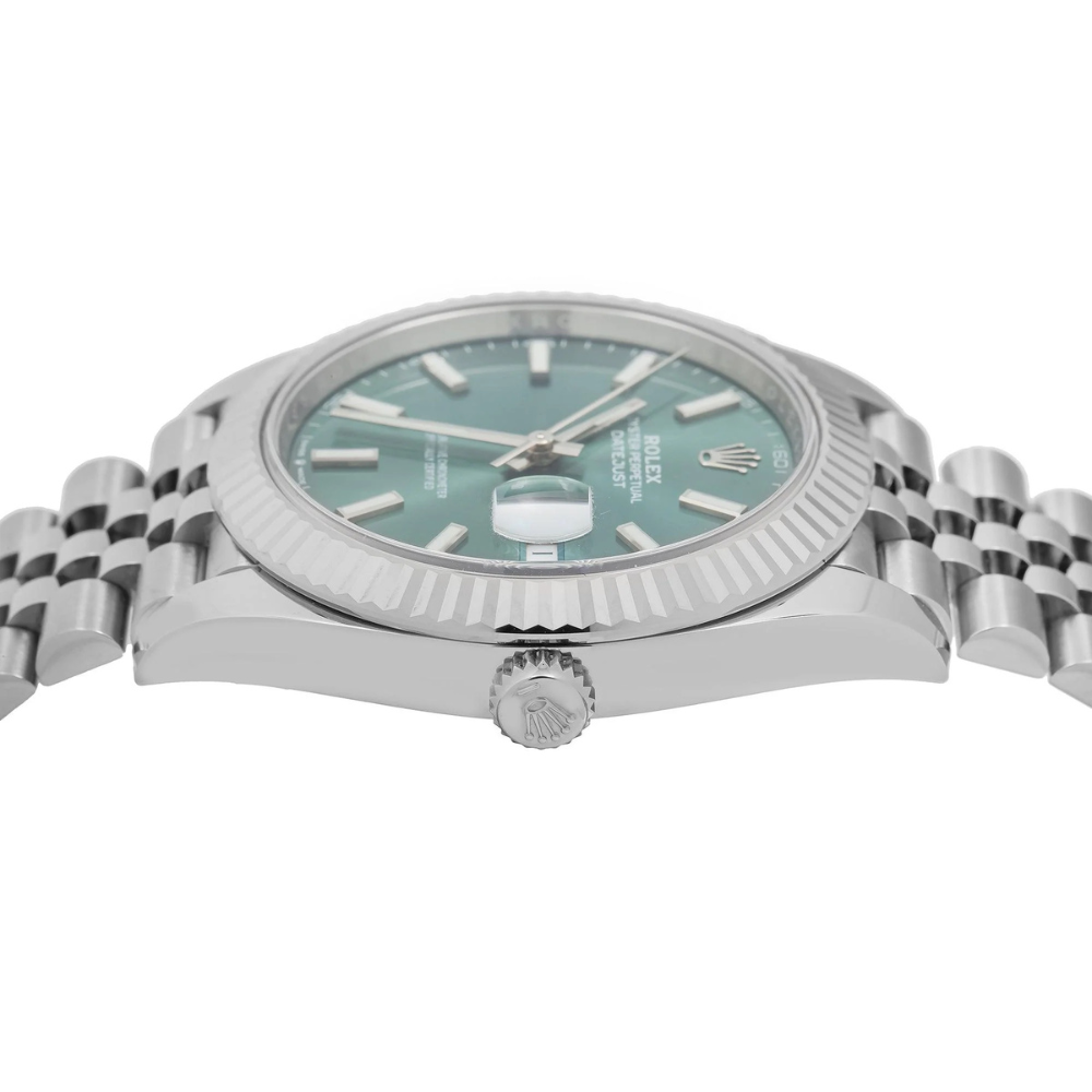 Classic three-hand, steel, green sunburst dial