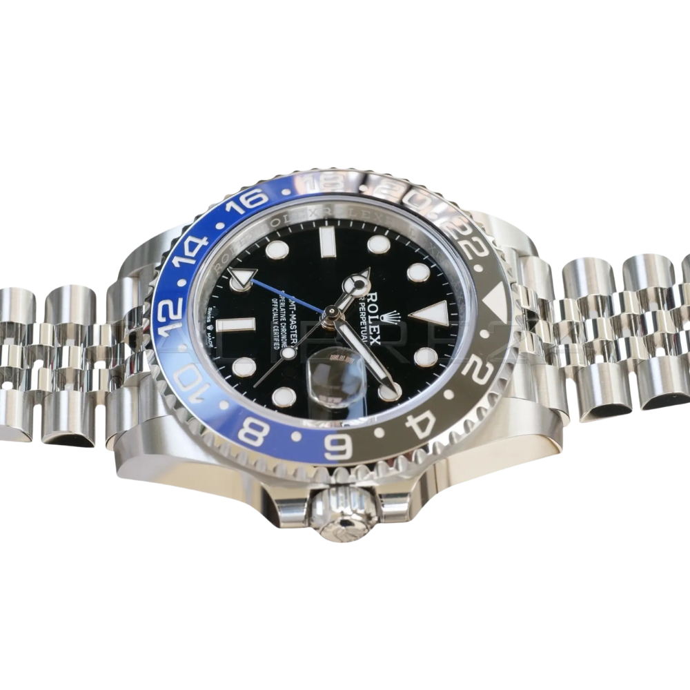 Steel GMT, two-tone black and blue 24-hour bezel, black dial with round markers, blue GMT hand, steel bracelet