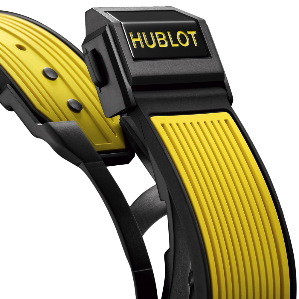 Sporty black and yellow tonneau, skeleton dial, yellow rubber strap