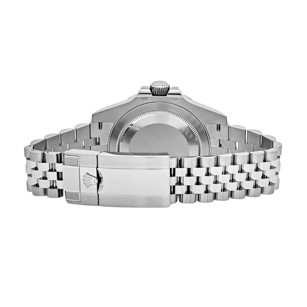 Classic three-hand, polished steel, smooth bezel, black dial with triangle at 12
