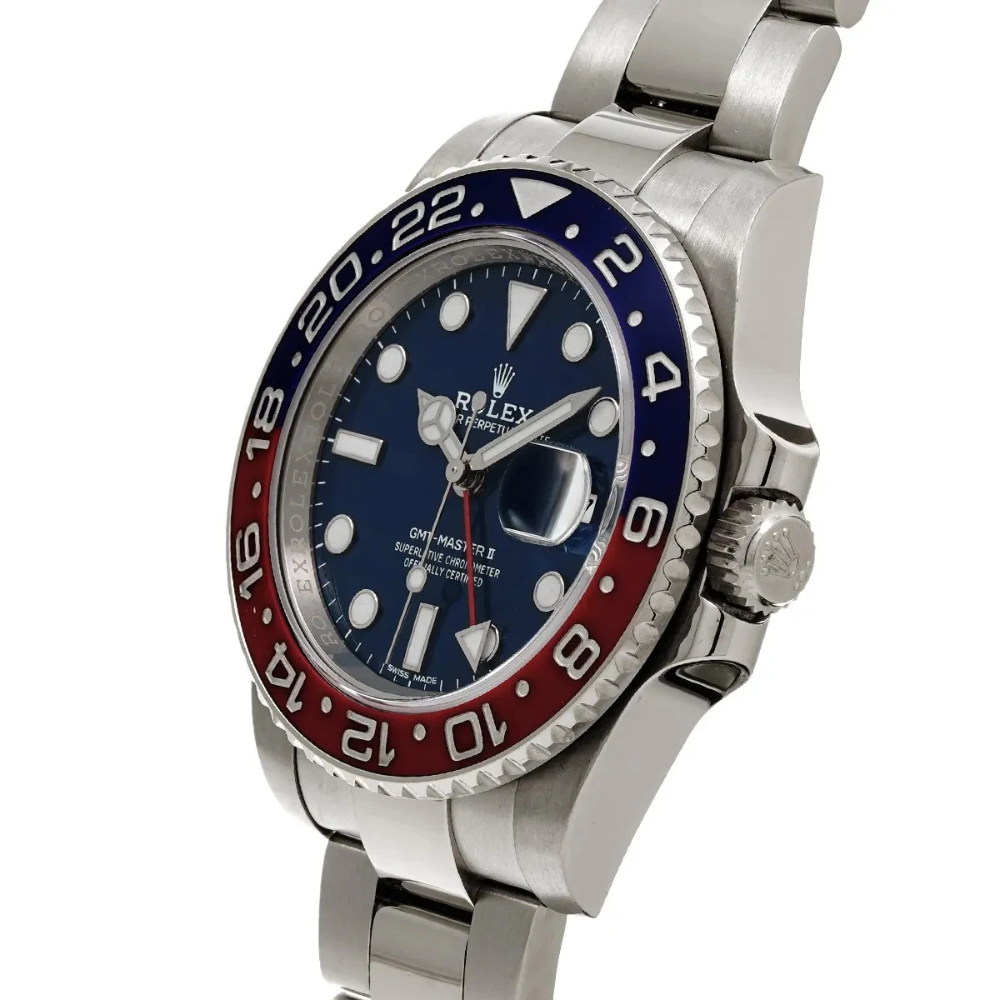 GMT, steel, black 24-hour bezel, triangle-tipped GMT hand