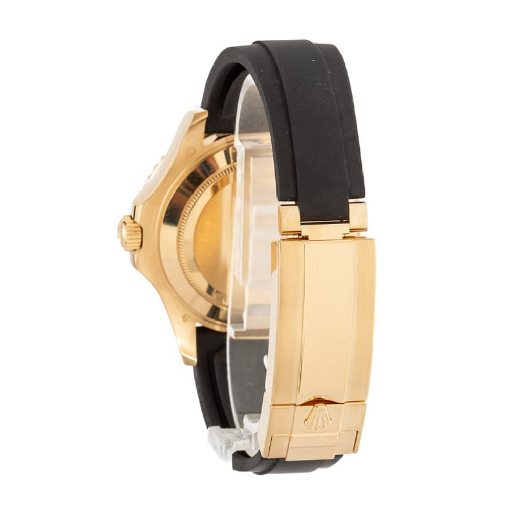 Gold case with black octagonal bezel, black dial, black rubber strap