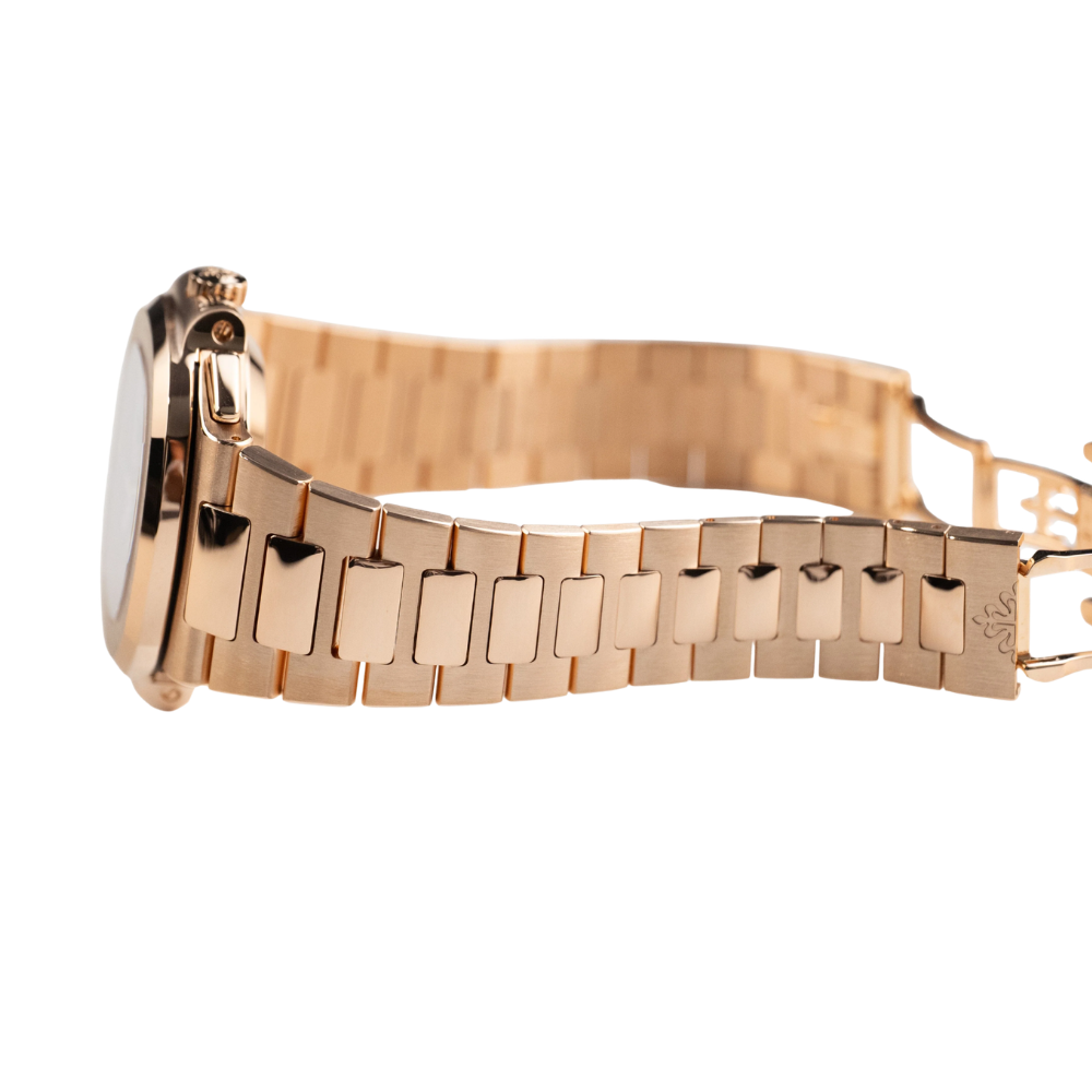 Rounded square with pushers on both sides, full rose gold, black dial