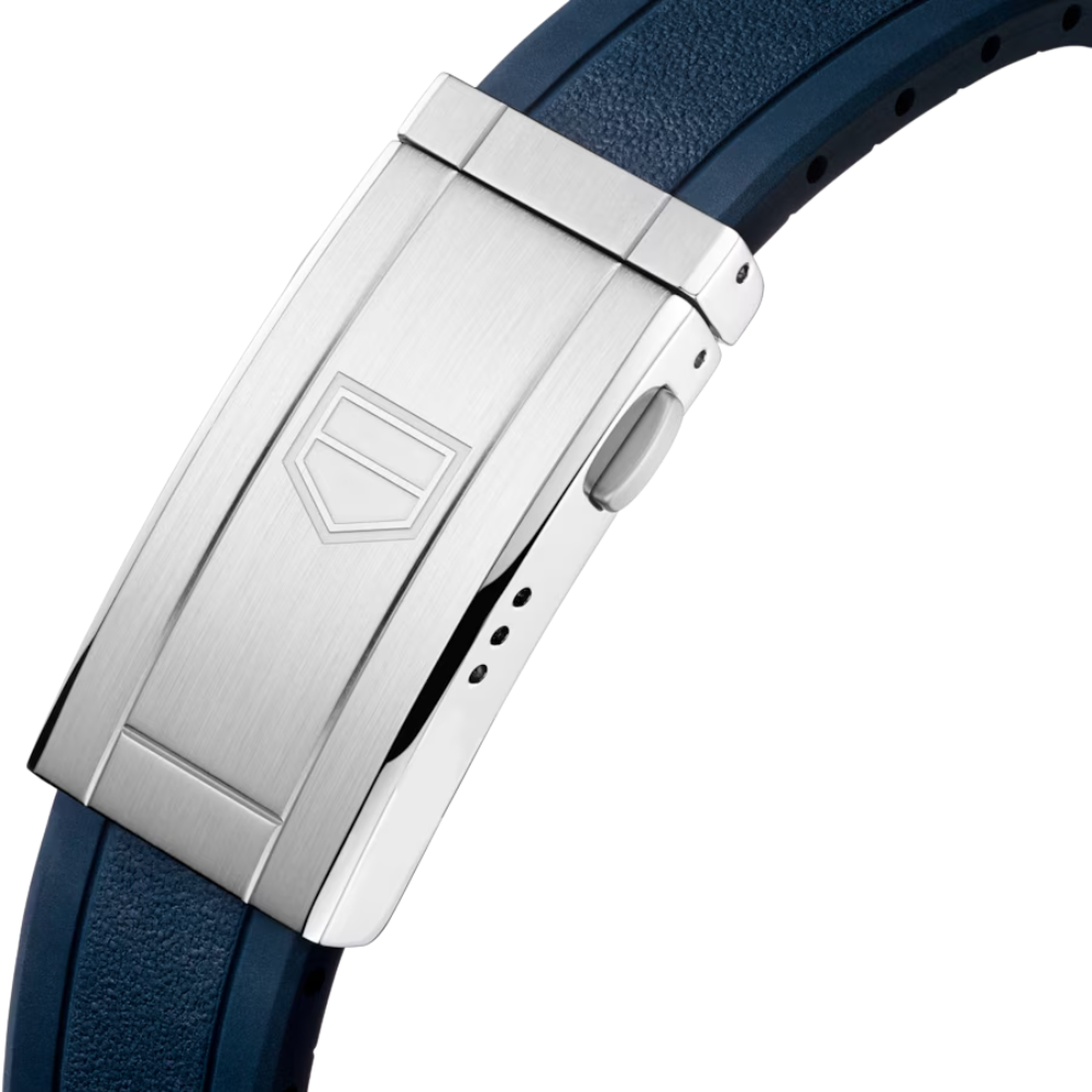 Octagonal, steel with bronze-olive bezel, ivory dial, white rubber strap