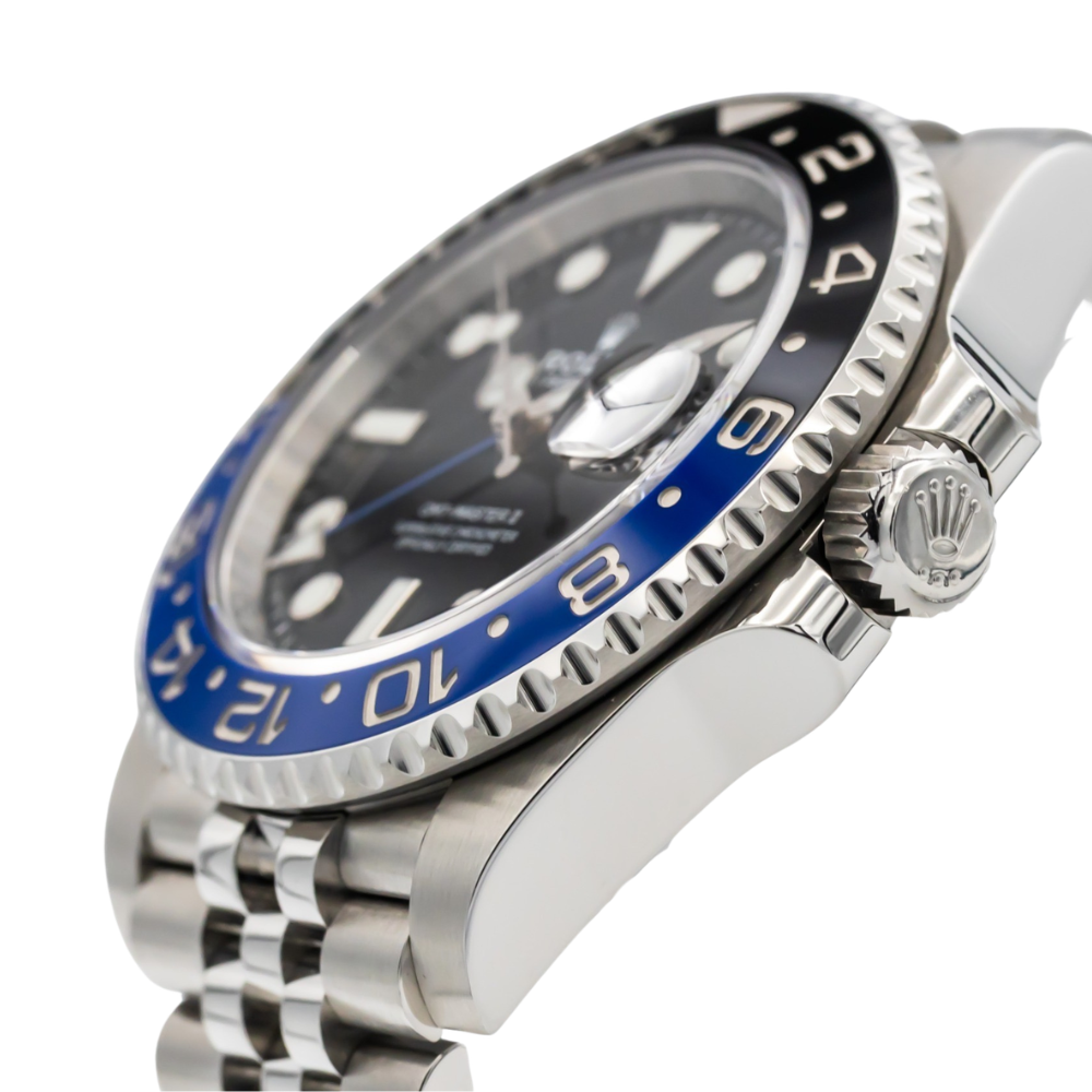 Steel GMT, two-tone black and blue 24-hour bezel, black dial with round markers, blue GMT hand, steel bracelet