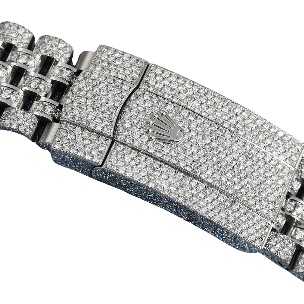 Faceted case, steel, silver-white dial, integrated bracelet