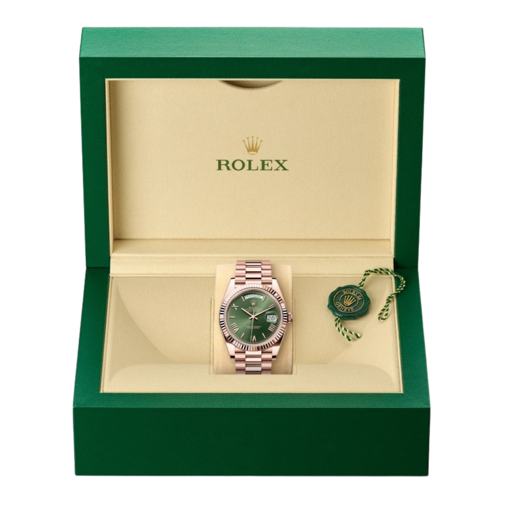 Full rose gold, wide polished bezel, green sunburst dial