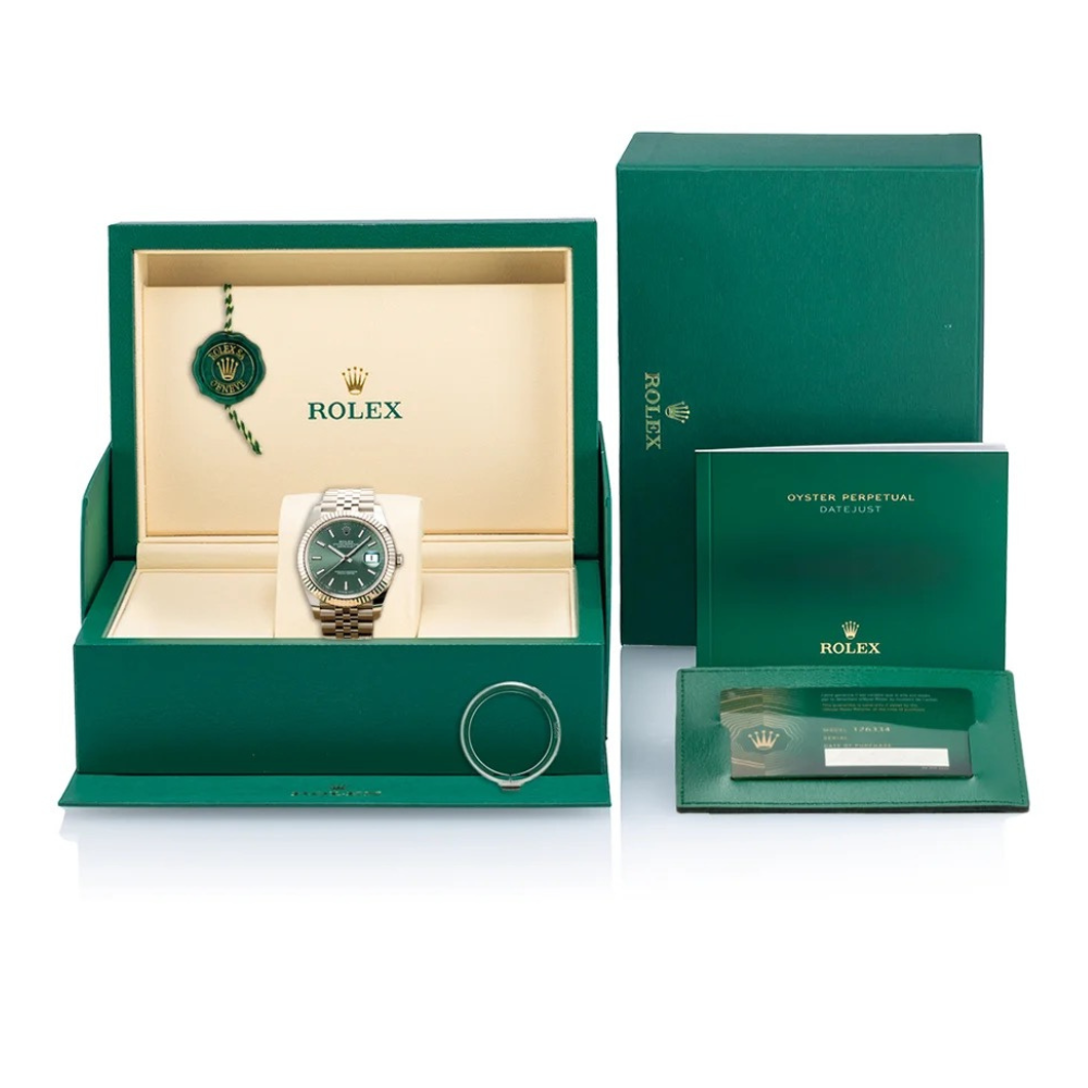 Classic three-hand, steel, green sunburst dial