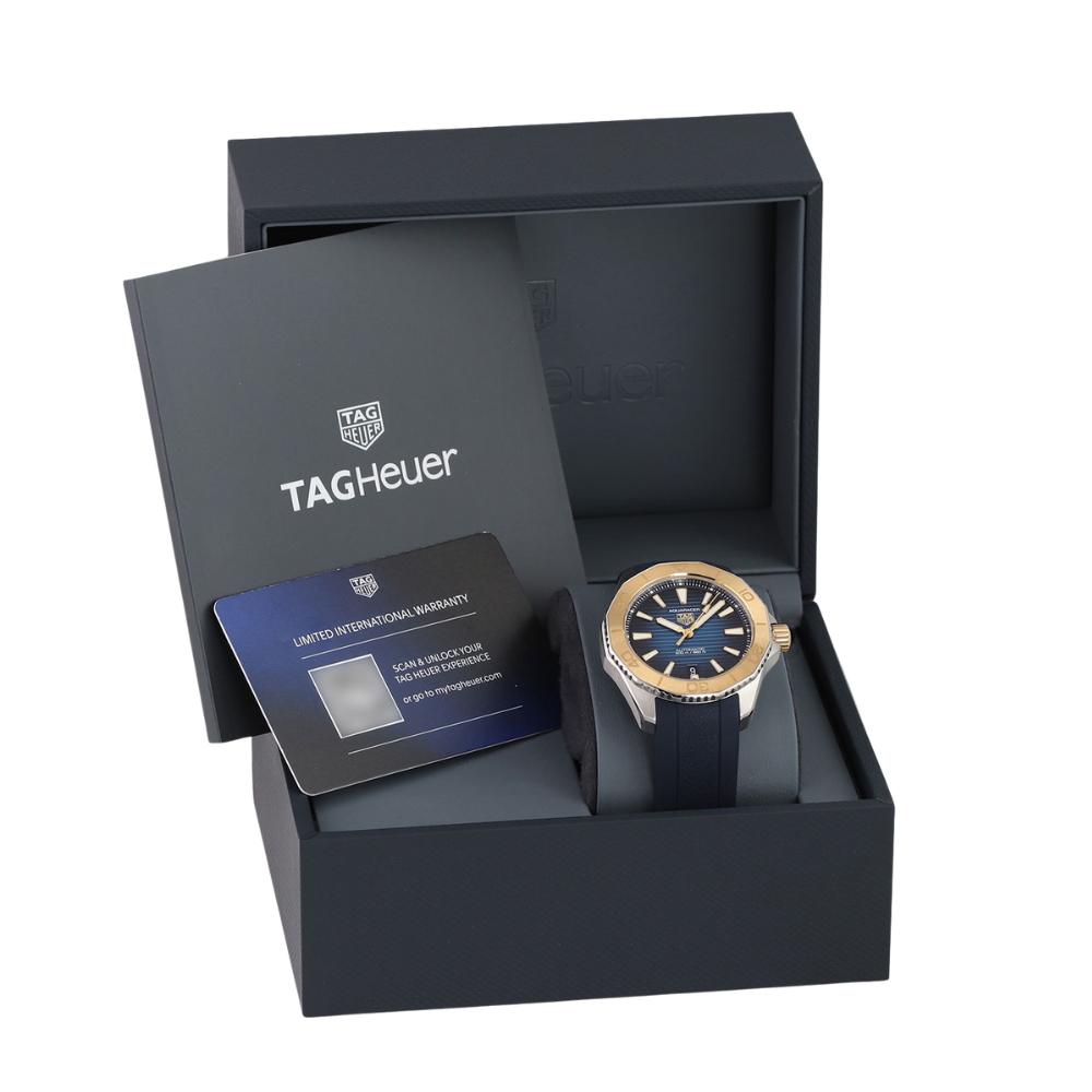 Octagonal, steel with bronze-olive bezel, ivory dial, white rubber strap