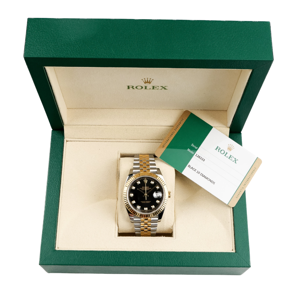 Two-tone, gold octagonal bezel with screws, black dial