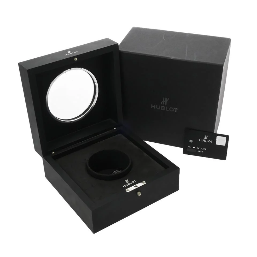 Chunky sport case with screwed bezel, white chronograph, white rubber strap