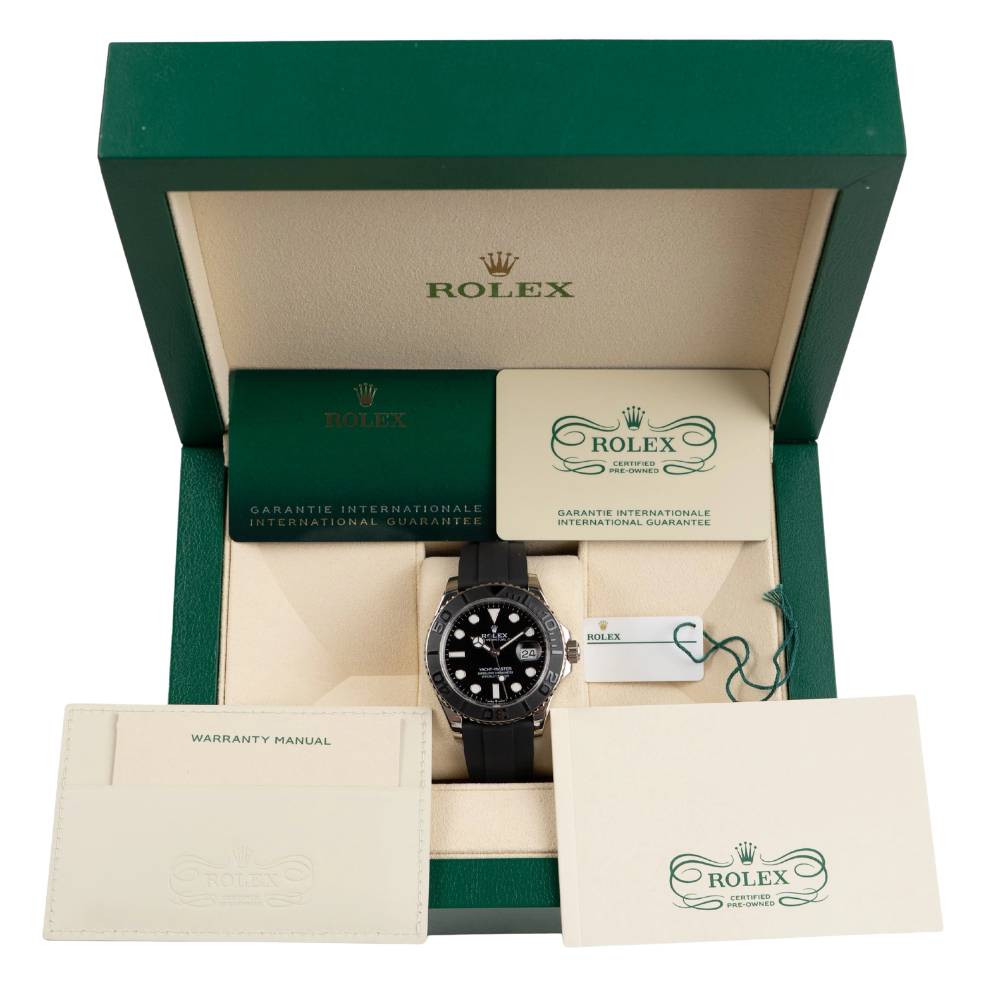 Octagonal case with 8-screw bezel, steel, black dial, black rubber strap