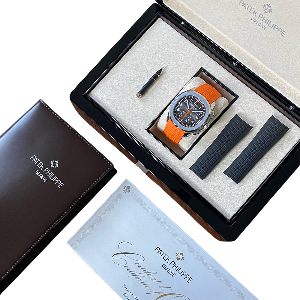 Steel, black gradient dial, orange seconds hand, orange rubber strap