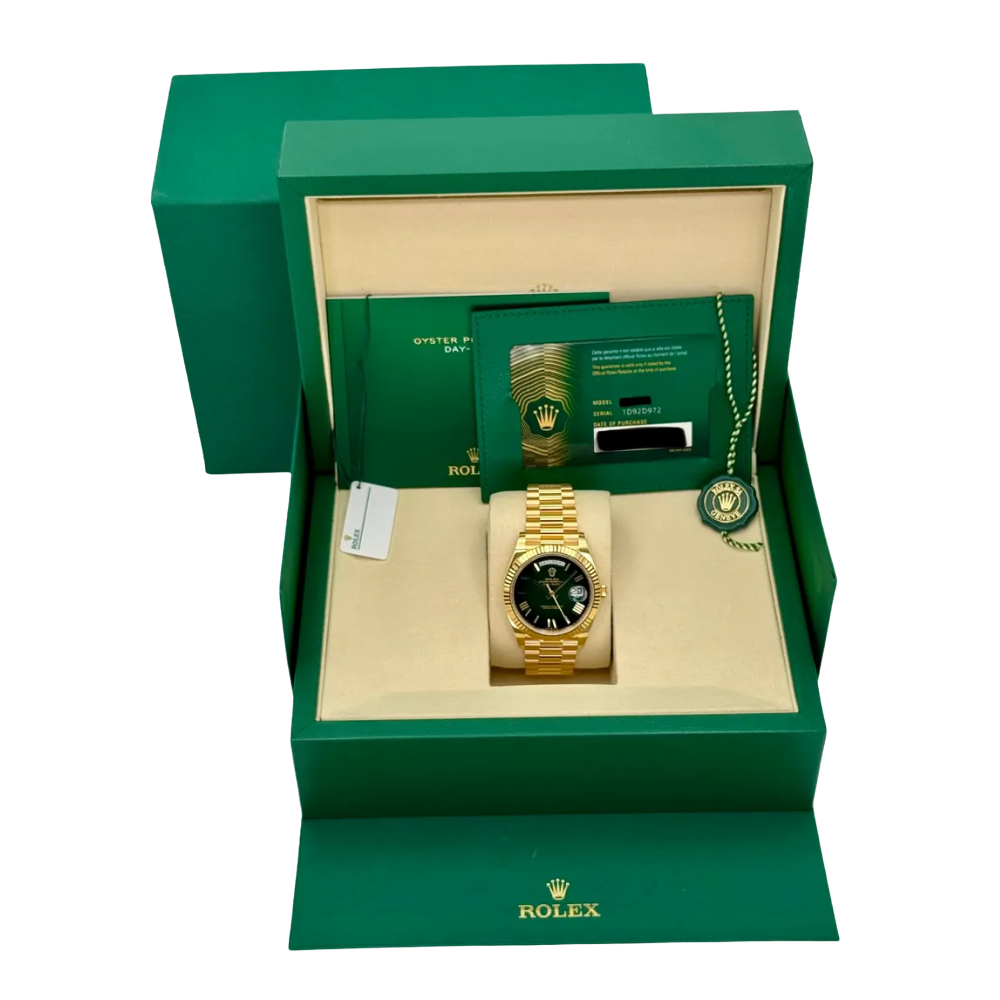 Faceted octagonal, full gold, emerald-green dial with baguette-style markers