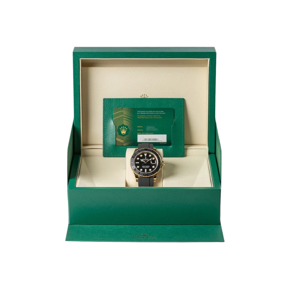 Gold case with black octagonal bezel, black dial, black rubber strap